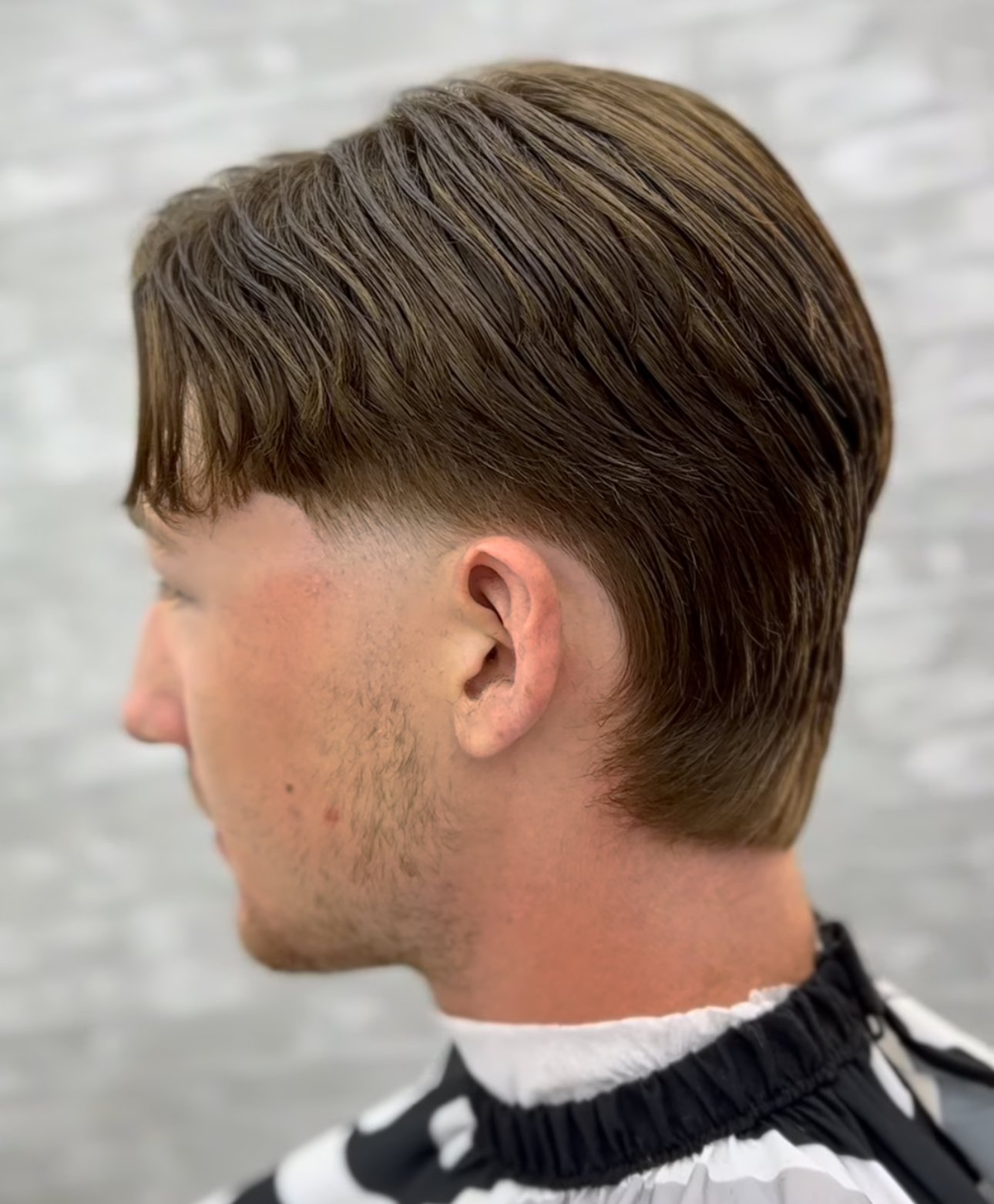 Longer style with clean taper by PN Barbershop